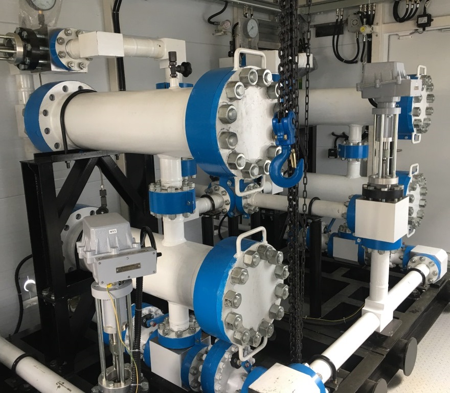 Photo of an indoor surface fluid treatment system in a pumping facility
